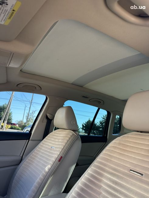 Volkswagen Tiguan 2009 черный - фото 6