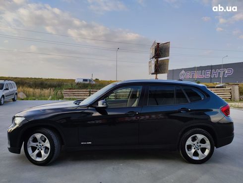 BMW X1 2014 черный - фото 9