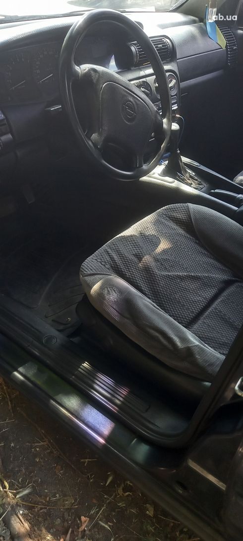 Opel Omega 1994 черный - фото 4