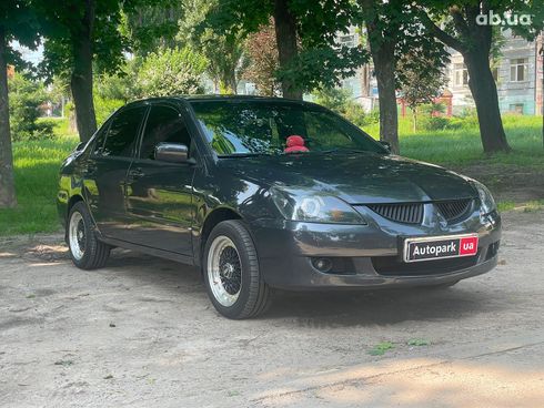 Mitsubishi Lancer 2003 черный - фото 3