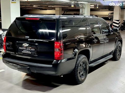 Chevrolet Suburban 2011 - фото 16