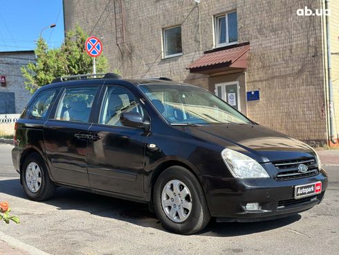 Kia Carnival 2008 черный - фото 9