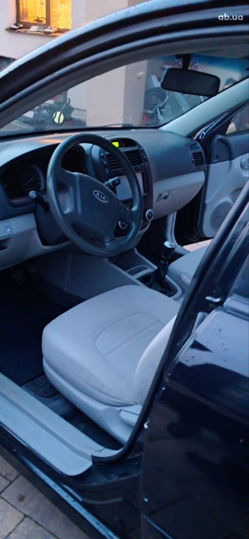Kia Cerato 2007 черный - фото 2