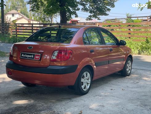 Kia Rio 2008 оранжевый - фото 7