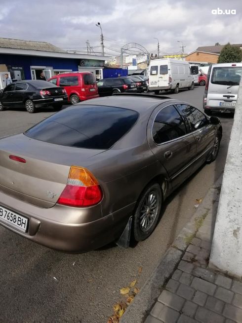 Chrysler 300M 2000 желтый - фото 3