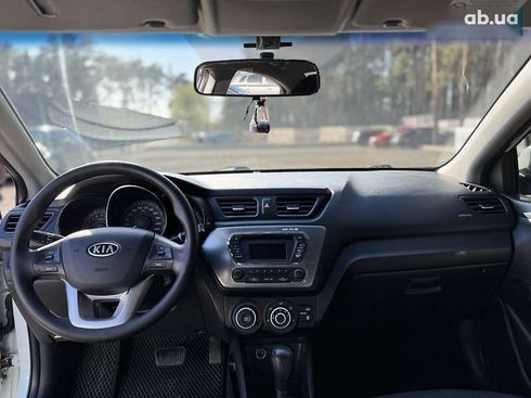 Kia Rio 2012 - фото 11