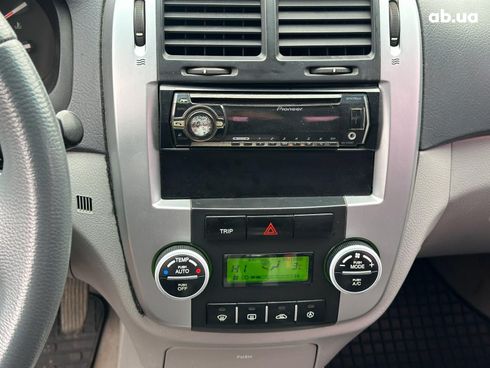 Kia Cerato 2007 красный - фото 18