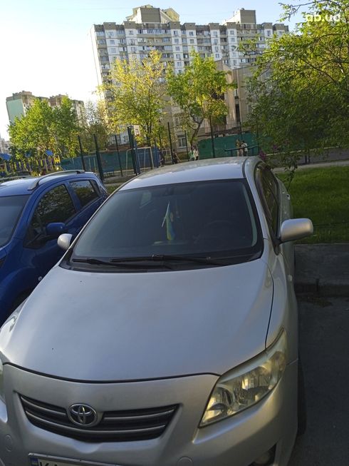 Toyota Corolla 2007 серебристый - фото 11