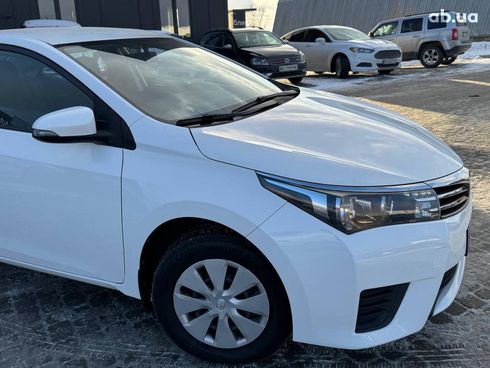 Toyota Corolla 2014 белый - фото 3