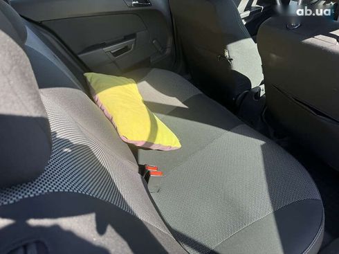 Opel Astra 2012 - фото 28