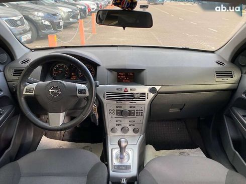 Opel Astra 2012 - фото 13