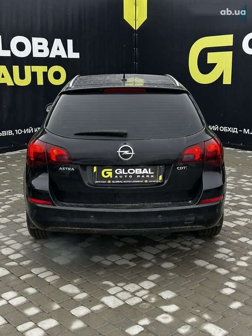 Opel Astra 2011 - фото 15