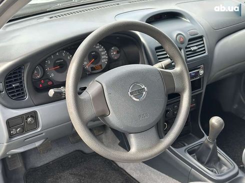 Nissan Almera 2006 - фото 21