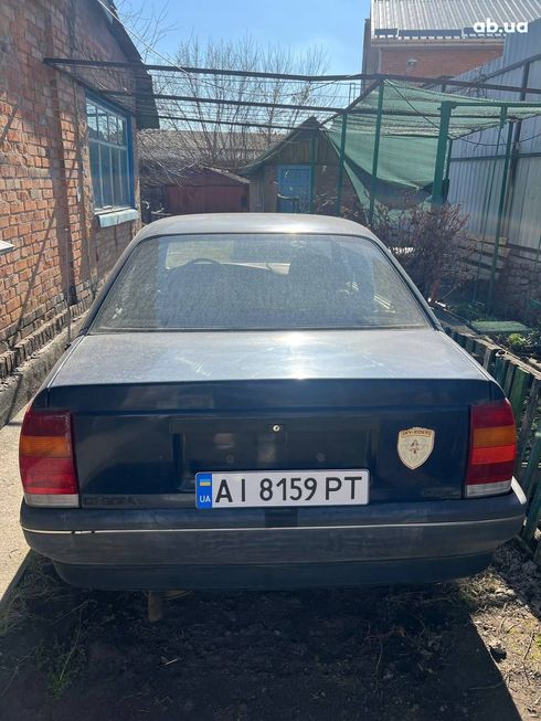 Opel Omega 1989 голубой - фото 6