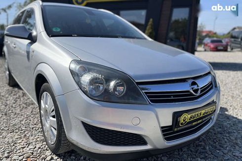 Opel Astra 2010 - фото 7