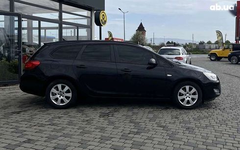 Opel Astra 2011 - фото 8