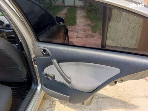 Skoda Octavia 2010 серебристый - фото 12