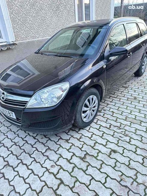Opel Astra 2008 черный - фото 9