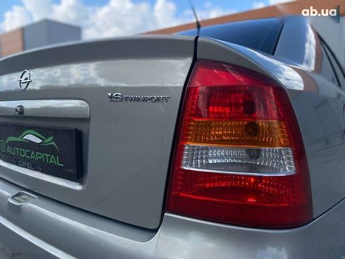 Opel Astra 2008 - фото 11