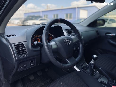 Toyota Corolla 2011 черный - фото 12