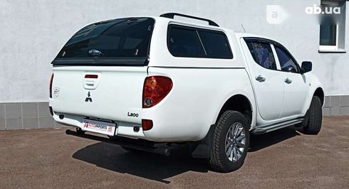 Mitsubishi l 200 2013 - фото 9