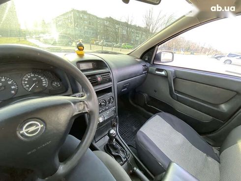 Opel Astra 2008 - фото 19