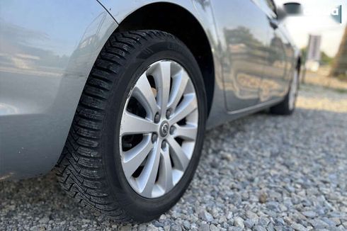 Opel Astra 2011 - фото 8