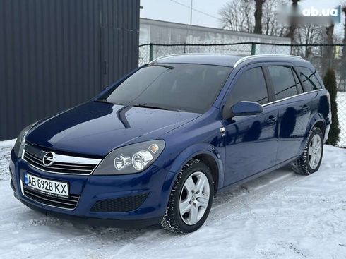 Opel Astra 2010 - фото 4