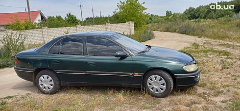 Opel Omega 1994 зеленый - фото 4