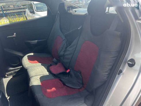 Kia Rio 2013 - фото 11