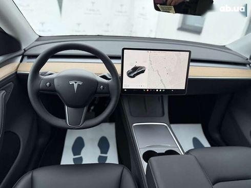 Tesla Model Y 2024 - фото 28