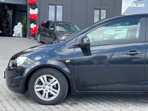 Chevrolet Aveo 2011 черный - фото 23