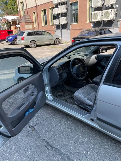 Nissan Almera 1998 серебристый - фото 6