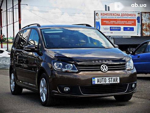 Volkswagen Touran 2011 - фото 4