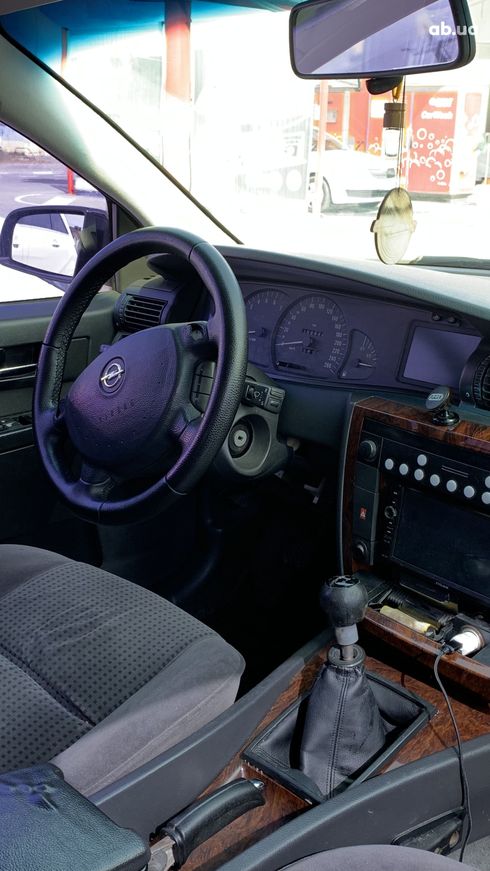 Opel Omega 2001 черный - фото 5