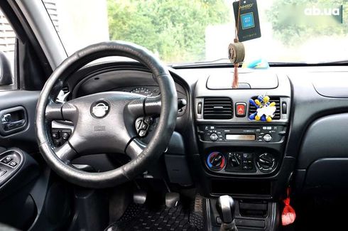 Nissan Almera 2004 - фото 30