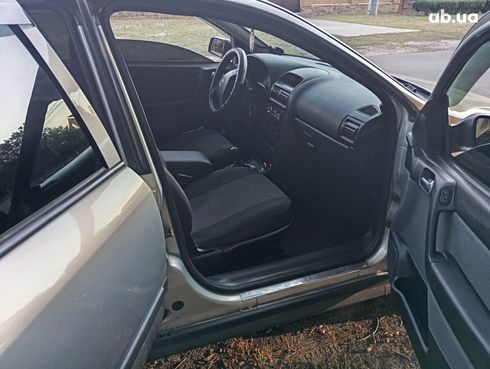 Opel Astra G 2008 серебристый - фото 7