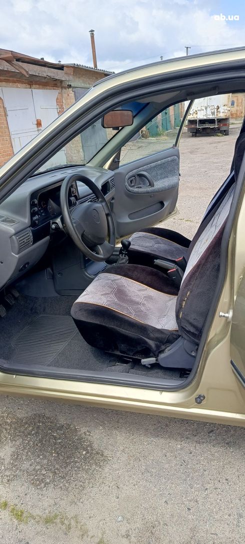 Daewoo Nexia 2008 золотистый - фото 3