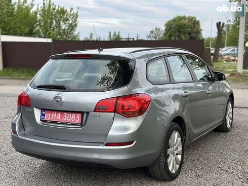 Opel Astra 2010 - фото 21