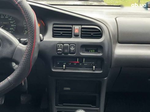 Mazda 323 1996 - фото 13