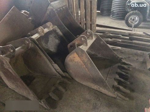 Komatsu WB 2007 - фото 15