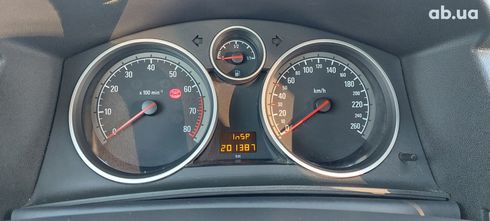 Opel Astra 2009 серебристый - фото 16