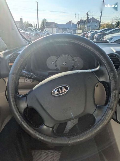 Kia Carens 2007 - фото 13