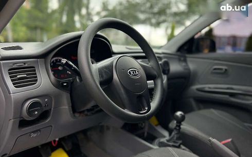 Kia Rio 2010 - фото 11