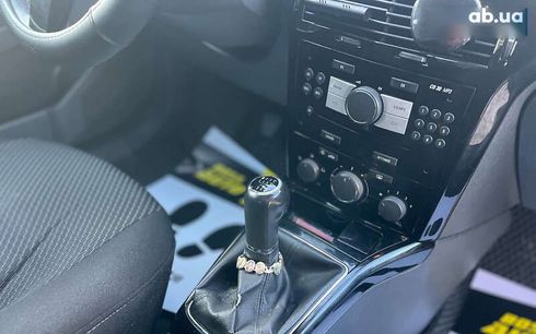 Opel Astra 2010 - фото 14