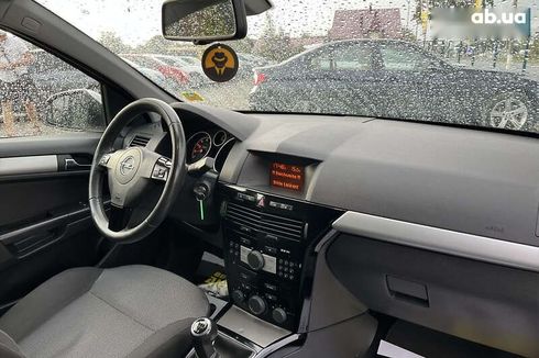 Opel Astra 2010 - фото 26