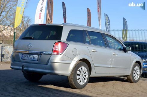 Opel Astra 2010 - фото 13