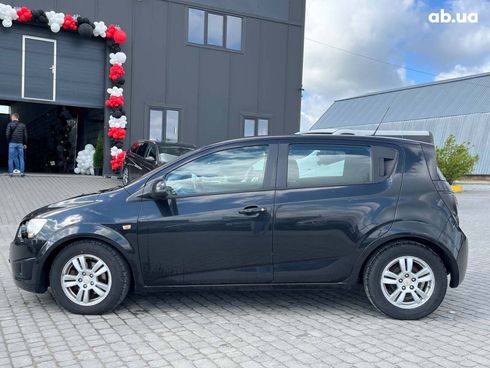 Chevrolet Aveo 2011 черный - фото 8