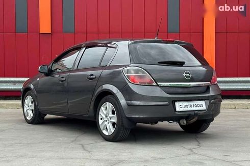 Opel Astra 2010 - фото 5