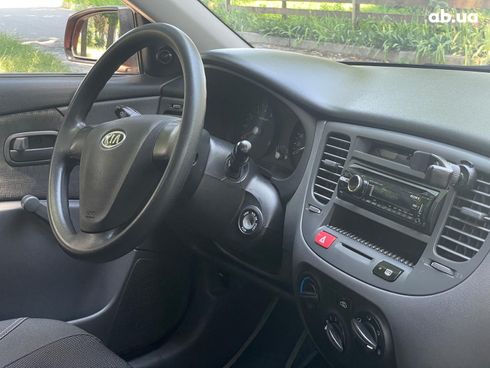 Kia Rio 2008 оранжевый - фото 24